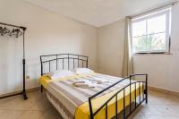 Łóżko lub łóżka w pokoju w obiekcie Apartments Gloria