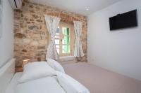 Posteľ alebo postele v izbe v ubytovaní Cindro Apartment with Terrace