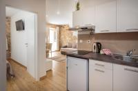 Kuchyňa alebo kuchynka v ubytovaní Cindro Apartment with Terrace