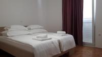 Posteľ alebo postele v izbe v ubytovaní Villa-Apartments Karmel