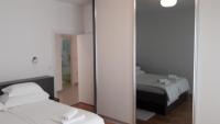 Posteľ alebo postele v izbe v ubytovaní Villa-Apartments Karmel
