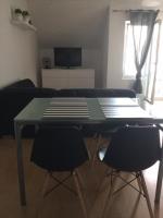 Televízia a/alebo spoločenská miestnosť v ubytovaní Apartment Melody