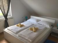 Posteľ alebo postele v izbe v ubytovaní Apartment Melody