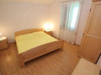 Postel nebo postele na pokoji v ubytování Apartments Vjera