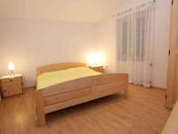 Postel nebo postele na pokoji v ubytování Apartments Vjera