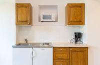 Kuchyň nebo kuchyňský kout v ubytování Apartments Vjera