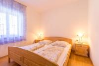 Postel nebo postele na pokoji v ubytování Apartments Vjera