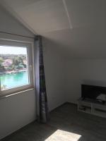 TV a/nebo společenská místnost v ubytování Apartments Suzana