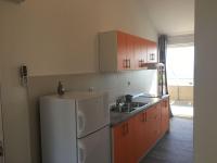 Kuchyň nebo kuchyňský kout v ubytování Apartments Suzana