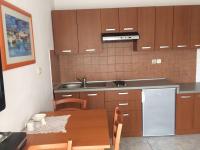 Kuchyň nebo kuchyňský kout v ubytování Apartments Suzana