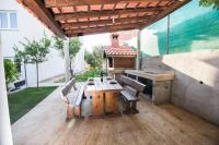 Patio nebo venkovní prostory v ubytování Apartments Adriana