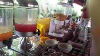 a counter with a coffee maker and a mixer at Santi Mandala Villa & Spa in Sukawati