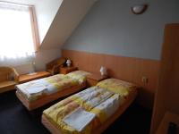 Postel nebo postele na pokoji v ubytování Penzion U Kašných