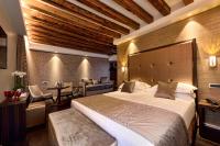 Posteľ alebo postele v izbe v ubytovaní Rosa Salva Hotel