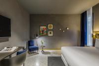 Posteľ alebo postele v izbe v ubytovaní Room Mate Collection Gerard, Barcelona