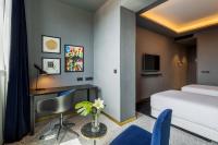 Posteľ alebo postele v izbe v ubytovaní Room Mate Collection Gerard, Barcelona