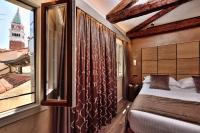 Posteľ alebo postele v izbe v ubytovaní Rosa Salva Hotel