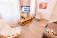 Televízia a/alebo spoločenská miestnosť v ubytovaní BpR D8 Premier Apartment