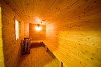 a wooden sauna with a bench in the middle at Dongpo Ti Lun Hotel in Xinyi