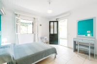 Posteľ alebo postele v izbe v ubytovaní Panorama Apartments updated with infinity pool