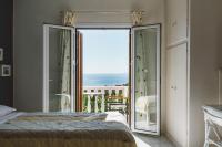 Posteľ alebo postele v izbe v ubytovaní Panorama Apartments updated with infinity pool