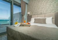 Postel nebo postele na pokoji v ubytování Denise Beach Hotel
