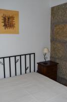 Uma cama ou camas num quarto em Casa do Chão do Ribeiro