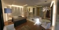 Postel nebo postele na pokoji v ubytování Kadrit Hotel