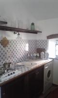 A kitchen or kitchenette at Casina in pietra