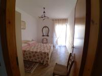 A bed or beds in a room at Il Belvedere
