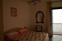 A bed or beds in a room at Il Belvedere