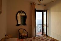 A bed or beds in a room at Il Belvedere