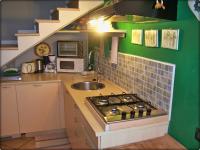 A kitchen or kitchenette at B&B La Casetta