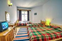 Postel nebo postele na pokoji v ubytování Hotel Kalina