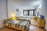 Postel nebo postele na pokoji v ubytování Hotel Kalina