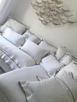 A bed or beds in a room at Nea Stira Studios Kondilia