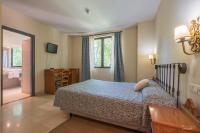 Posteľ alebo postele v izbe v ubytovaní Hotel Batuecas