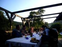 a group of people sitting at a table eating at Haus Dumicketal in Drolshagen