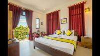 Quynh Chau Homestay Hội Anにあるベッド