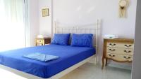 Postel nebo postele na pokoji v ubytování Plagia's Sunset Apartments