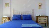 Postel nebo postele na pokoji v ubytování Plagia's Sunset Apartments