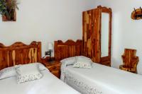 Postel nebo postele na pokoji v ubytování Casa Rural el Sastre
