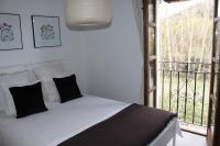 A bed or beds in a room at El Balcón del Huéznar