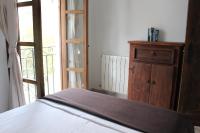 A bed or beds in a room at El Balcón del Huéznar