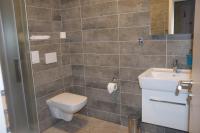 Koupelna v ubytování Hotel Rokiten
