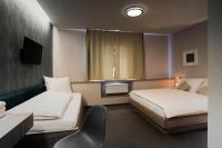 Postel nebo postele na pokoji v ubytování Hotel Rokiten