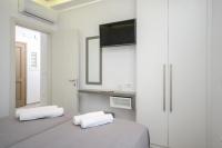 Posteľ alebo postele v izbe v ubytovaní Elegant Apartments