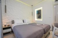 Posteľ alebo postele v izbe v ubytovaní Elegant Apartments