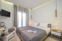 Posteľ alebo postele v izbe v ubytovaní Elegant Apartments