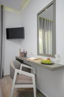 Televízia a/alebo spoločenská miestnosť v ubytovaní Elegant Apartments